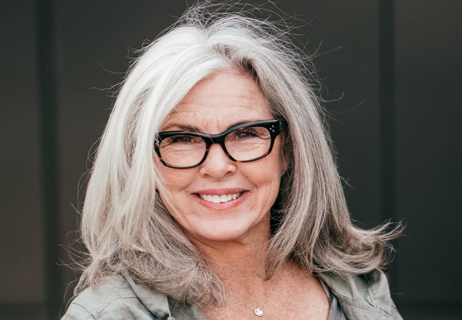 layered haircut for women over 60 with glasses