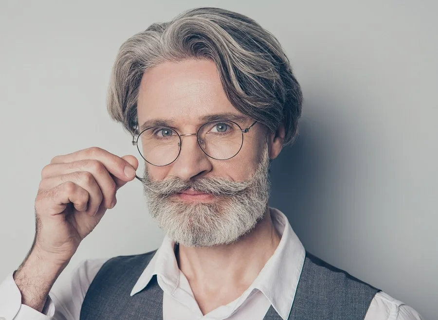 layered hairstyle for old men with glasses