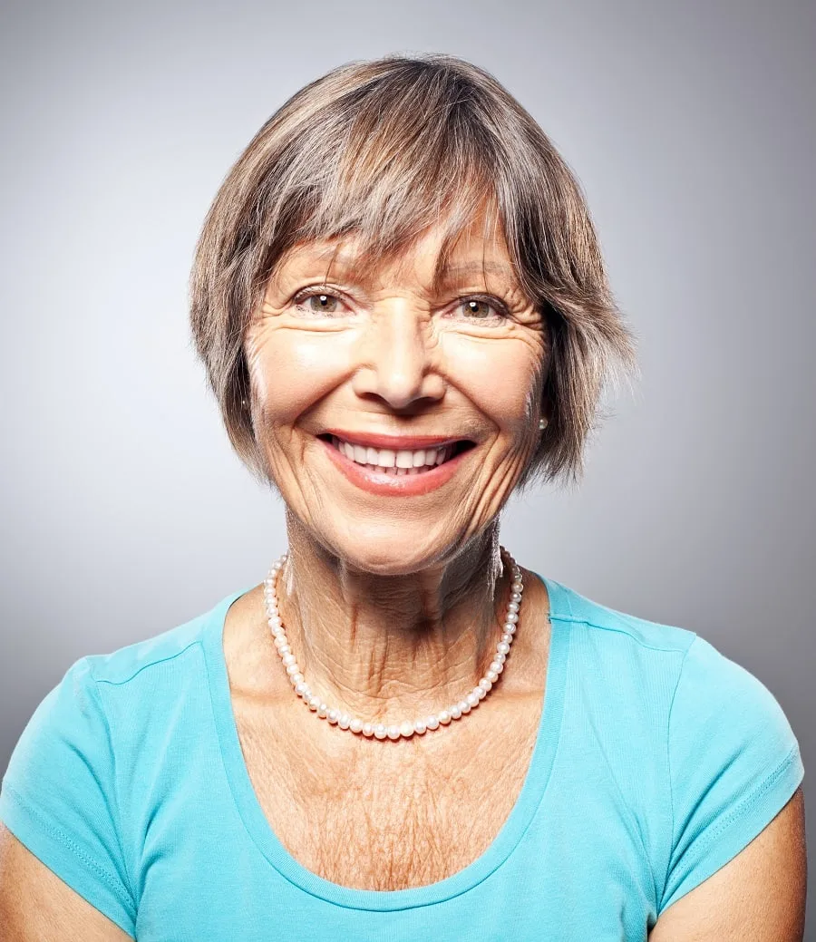 layered hairstyle for women over 60 with long faces