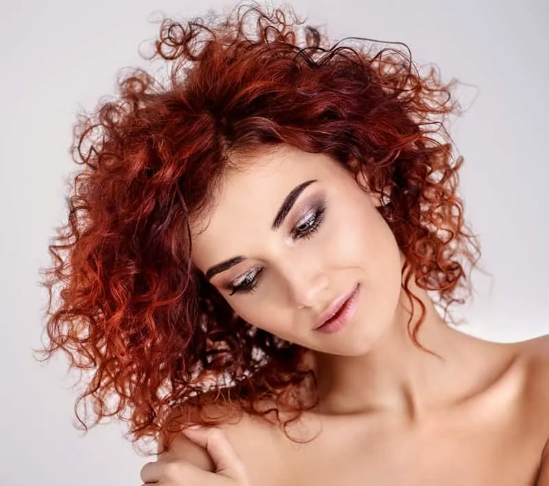 layered red curly hair