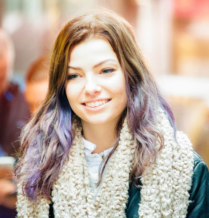 light brown hair with faded purple highlights