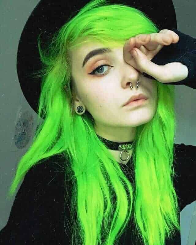 wispy lime green cut with side part hair