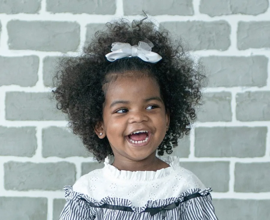 little black school girl with curls