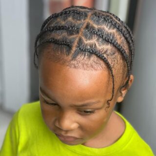 little black boy with cornrow braids