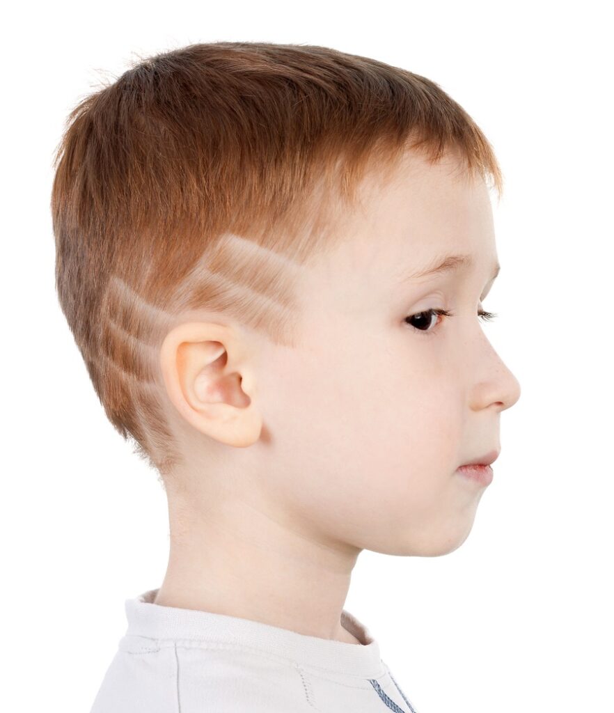 little boy straight haircut with design