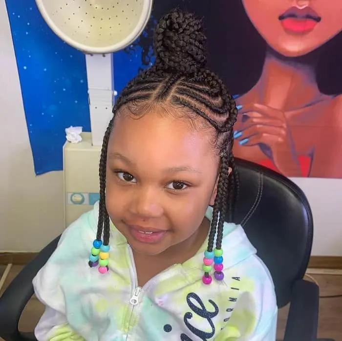 kid's braided updo with beads 