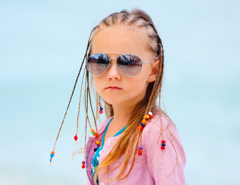 little girl half braids with beads