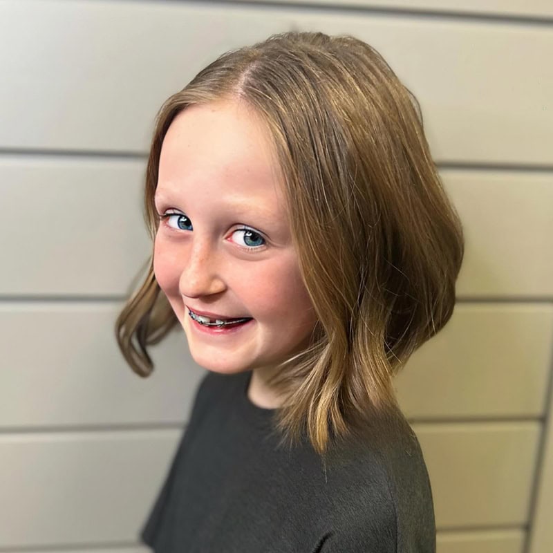 bob haircut styled with loose, wispy waves