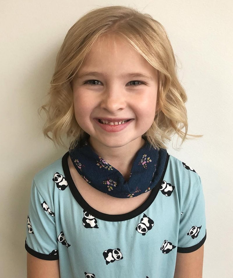 little girl textured choppy bob hairstyle featuring soft waves