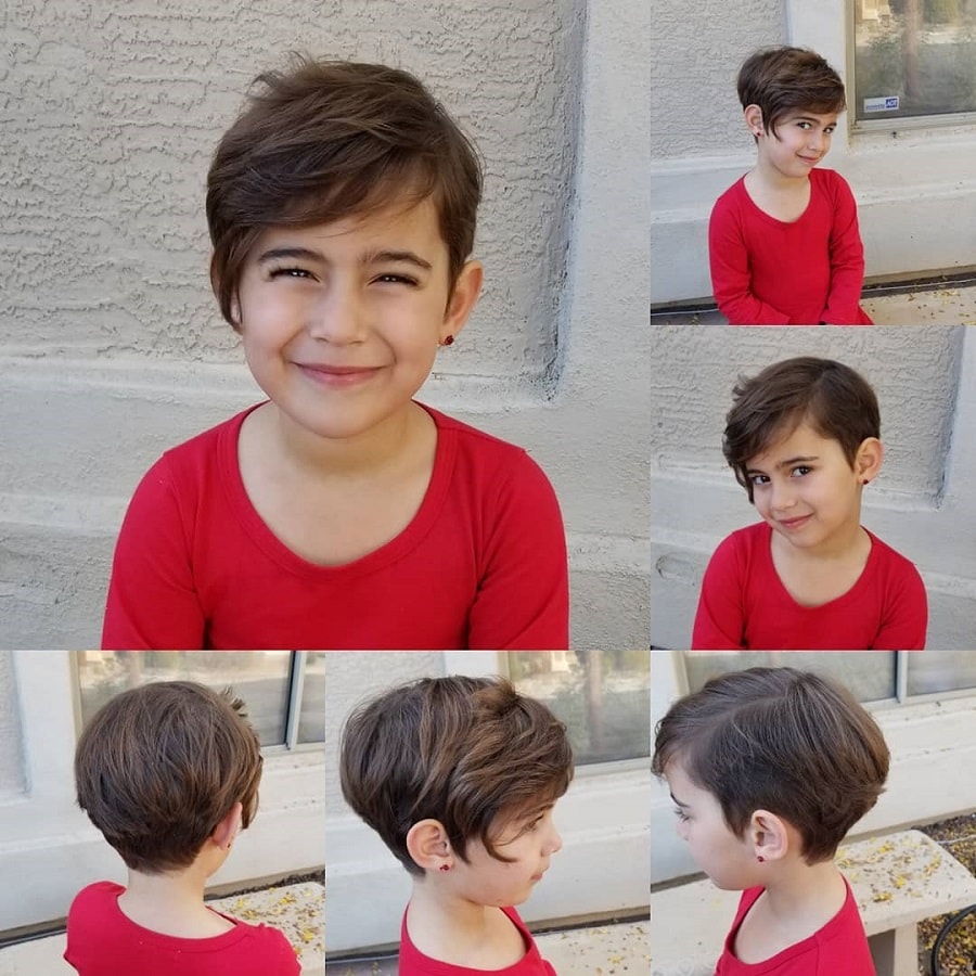 little girl with wispy pixie cut