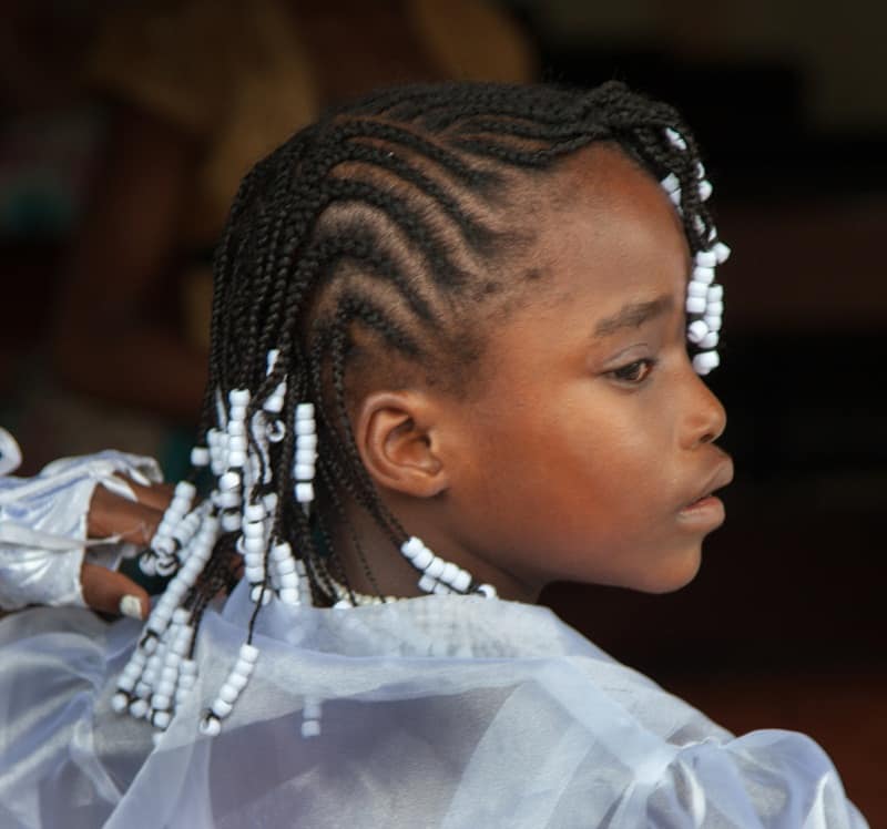 little girl's cornrow braids with beads