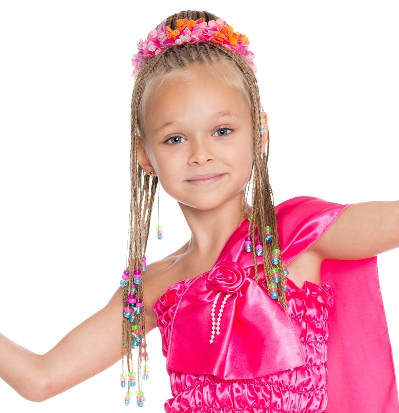 little girl's half up braids with beads