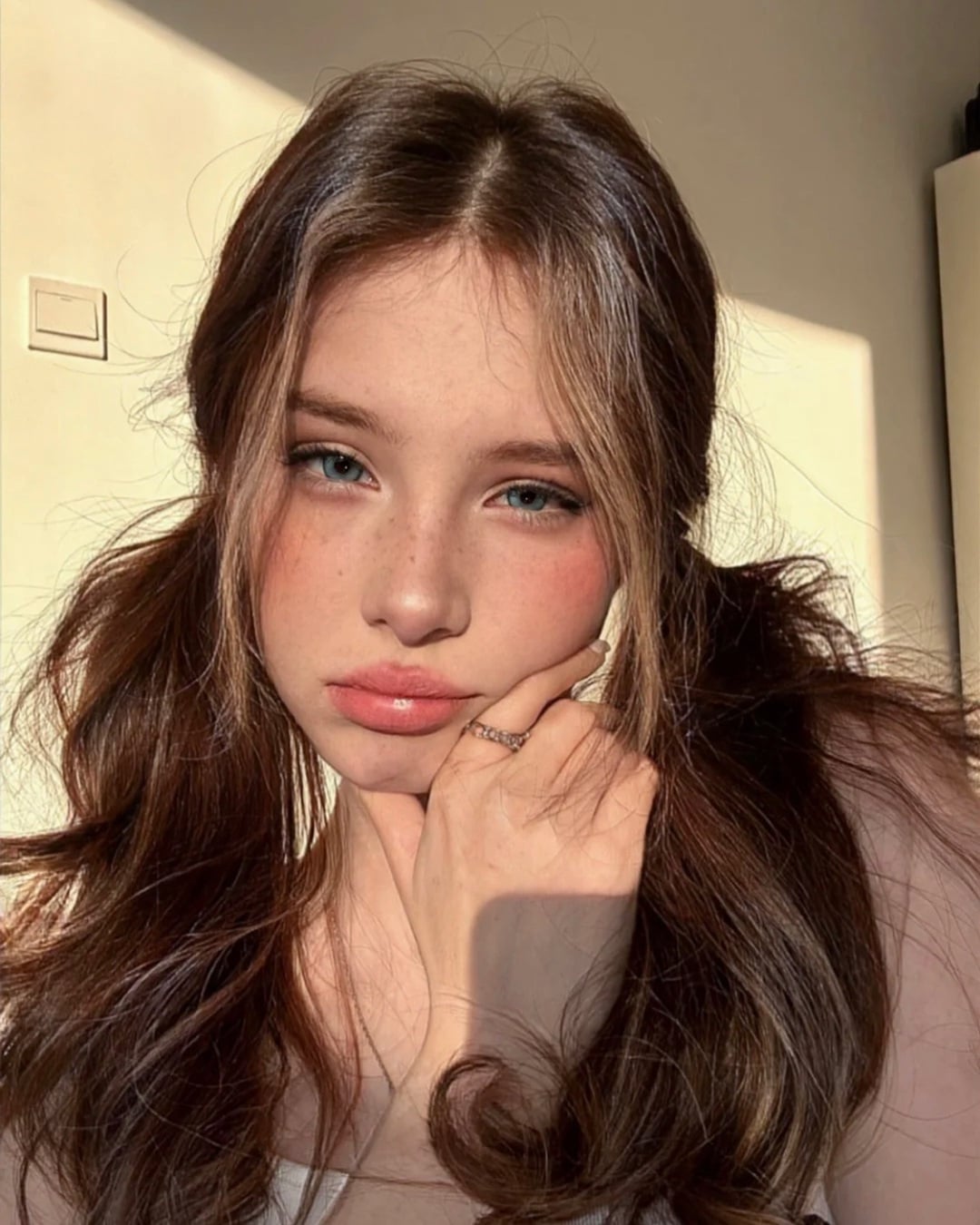 long loose pigtails with face-framing strands