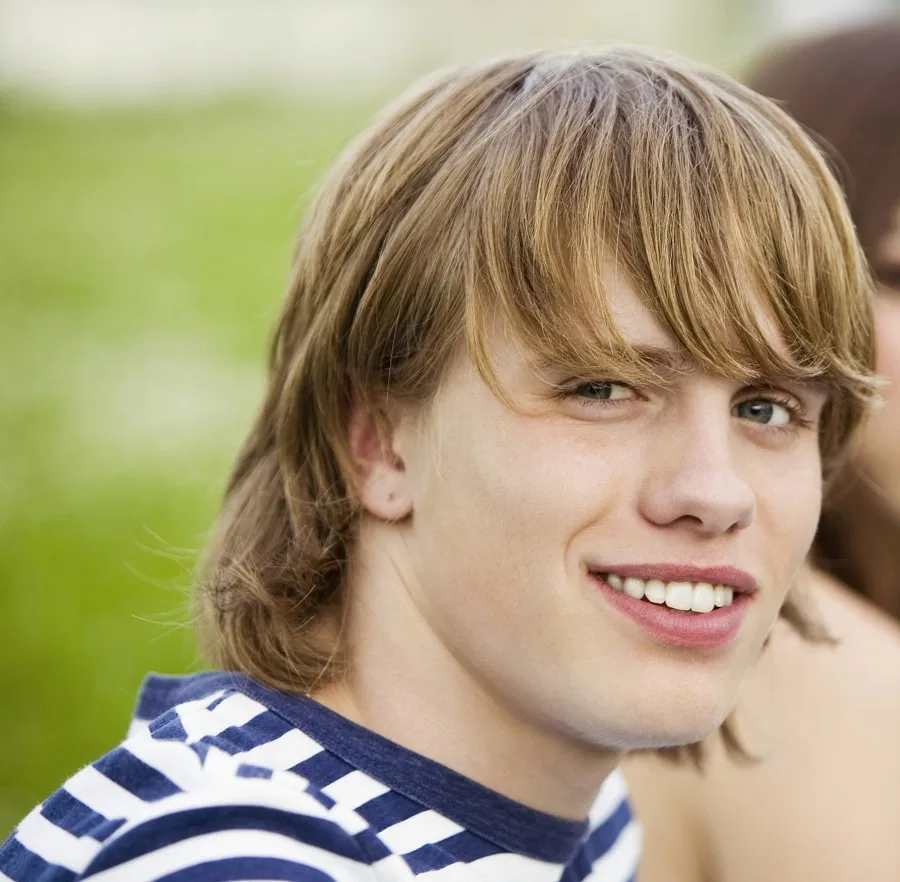 long blonde hairstyle for teenage guys