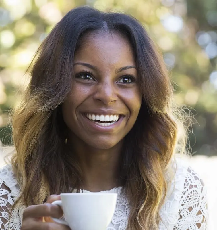 black woman with long brown hair