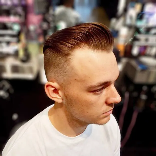 slick long comb over with high fade