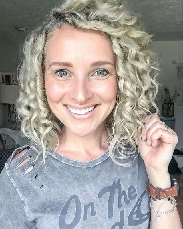 curly long platinum bob hairstyle