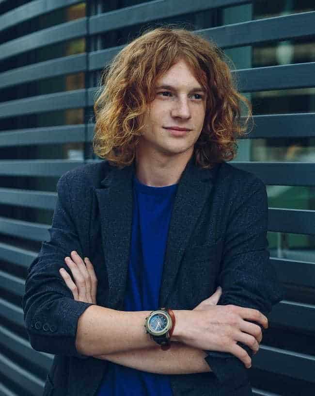 medium curly hairstyle for boys