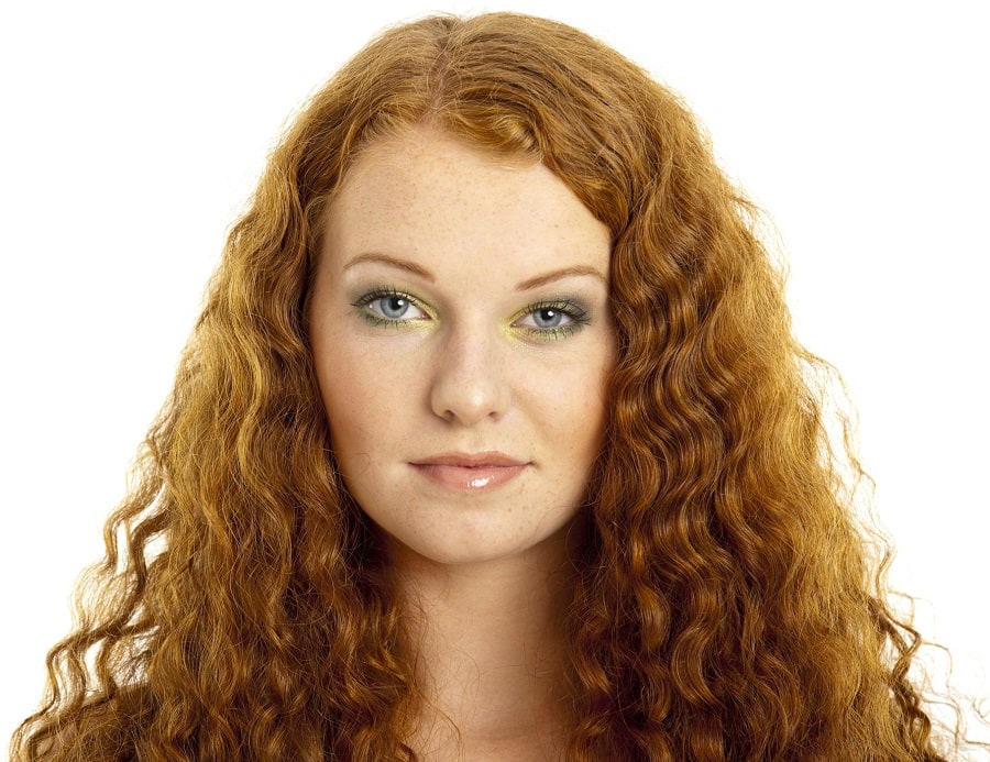 long curly hairstyle for big forehead