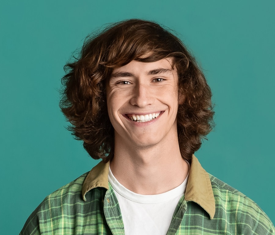 long curly hairstyle for teenage guys