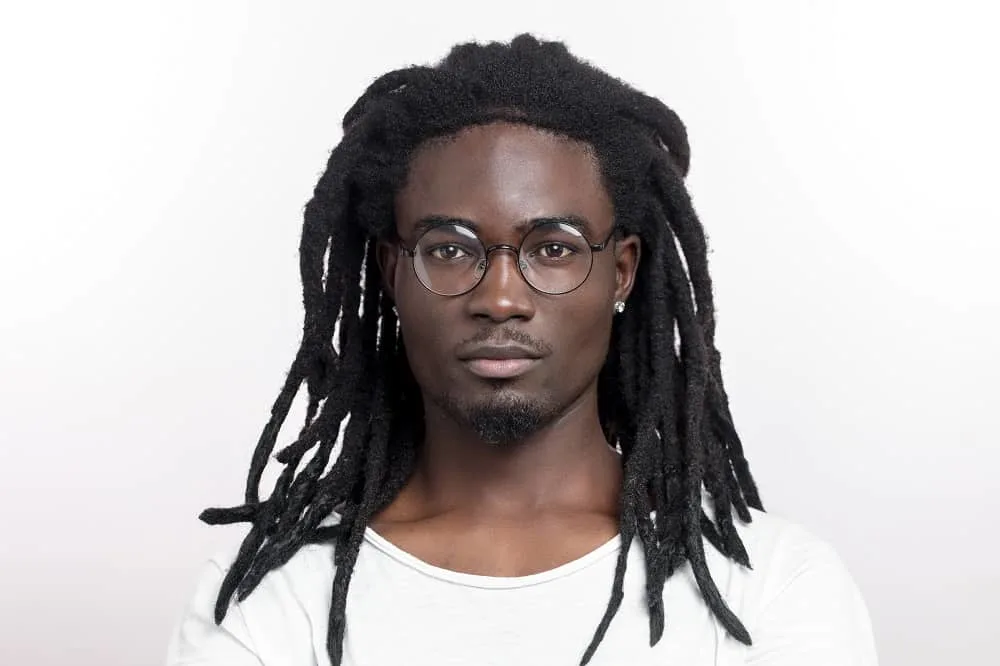 long dreads with beard and glasses