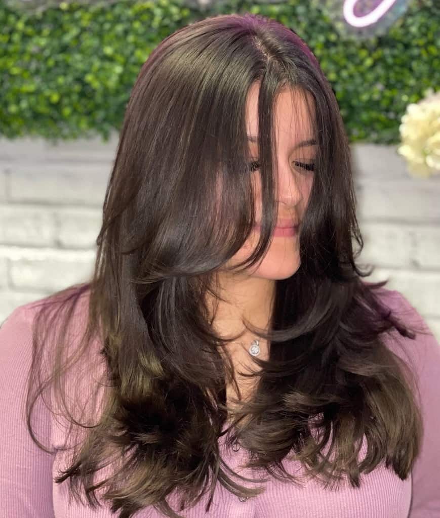 long feathered brunette hair