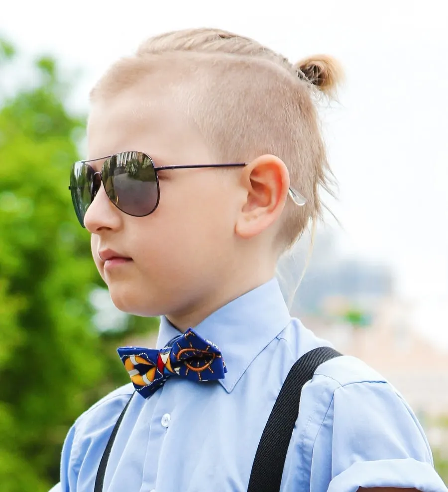 long hair topknot with short sides for boys