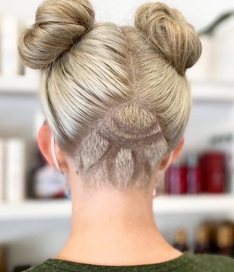 space buns with a graphic nape undercut
