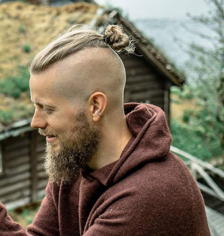 long hair man bun with shaved sides