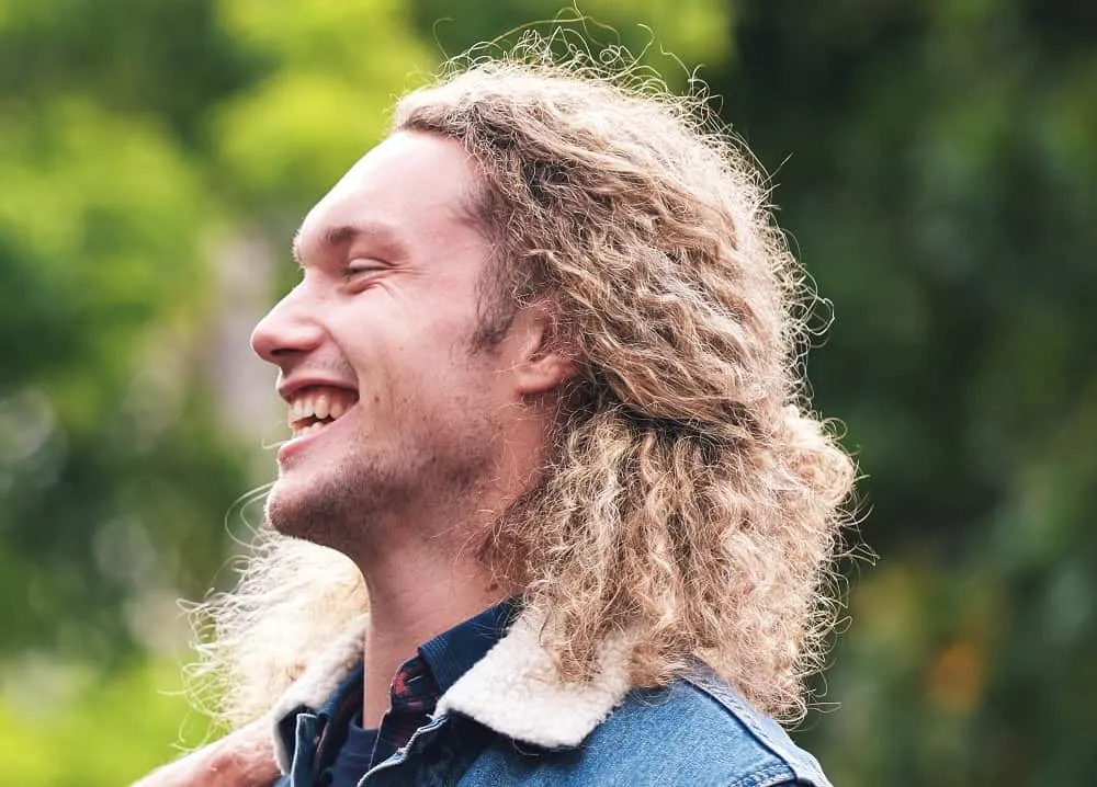 long half-up curly hair for men