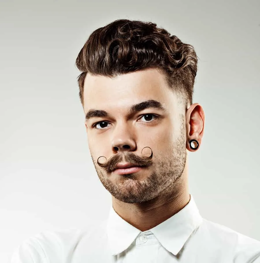 long handlebar mustache with short beard