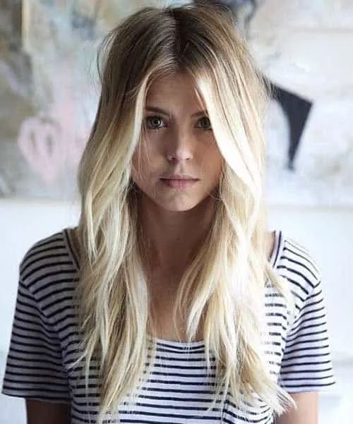 Layered Blonde Hair with Dark Roots