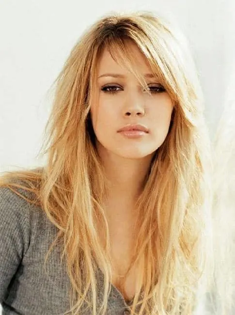 hairstyle with side swept bangs and layers