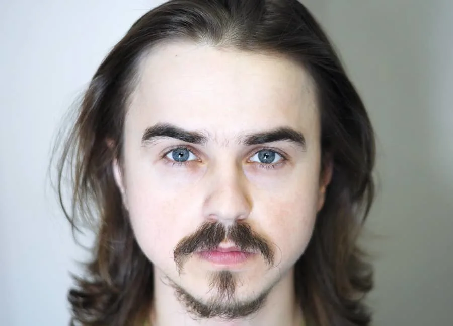 long mustache with short thin beard