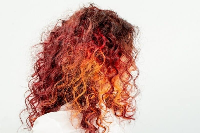 long red curly hair with highlights
