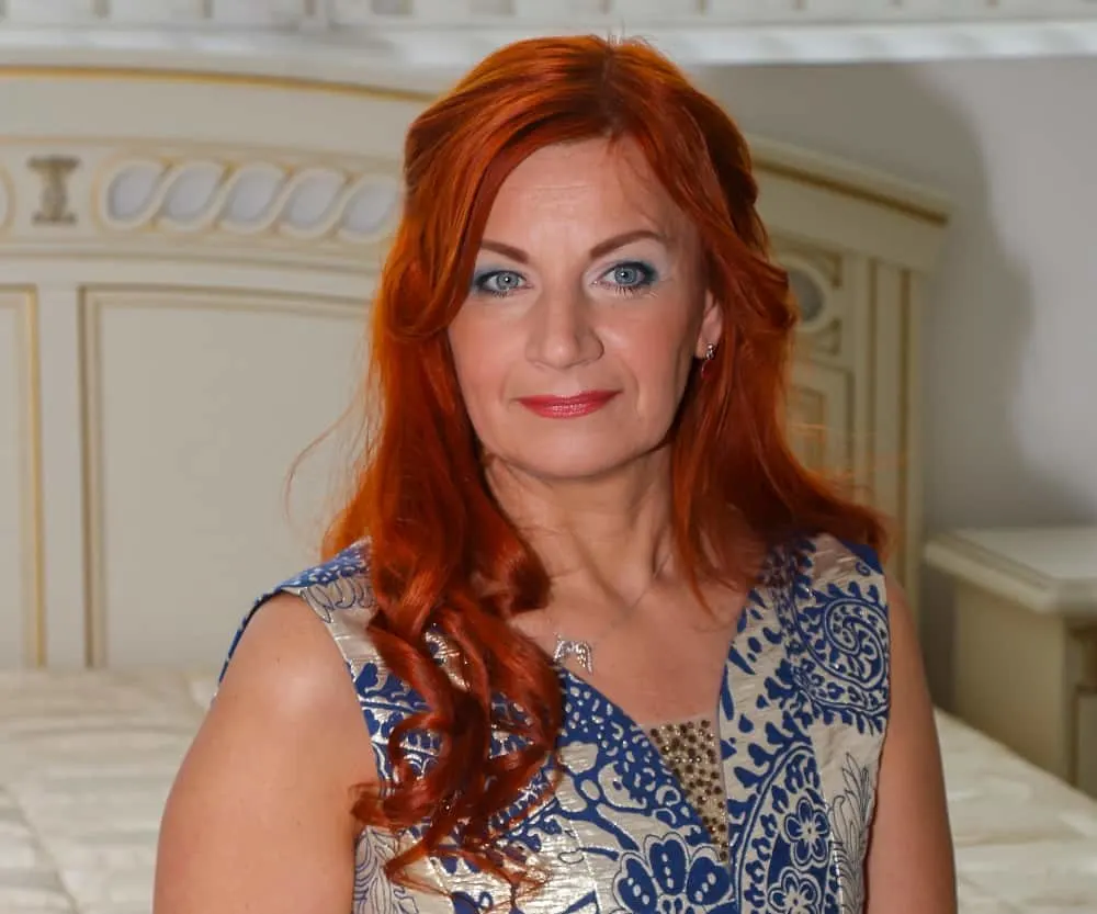 long red hairstyle for women over 50