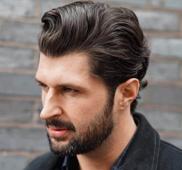 long messy slick back hairstyle for men