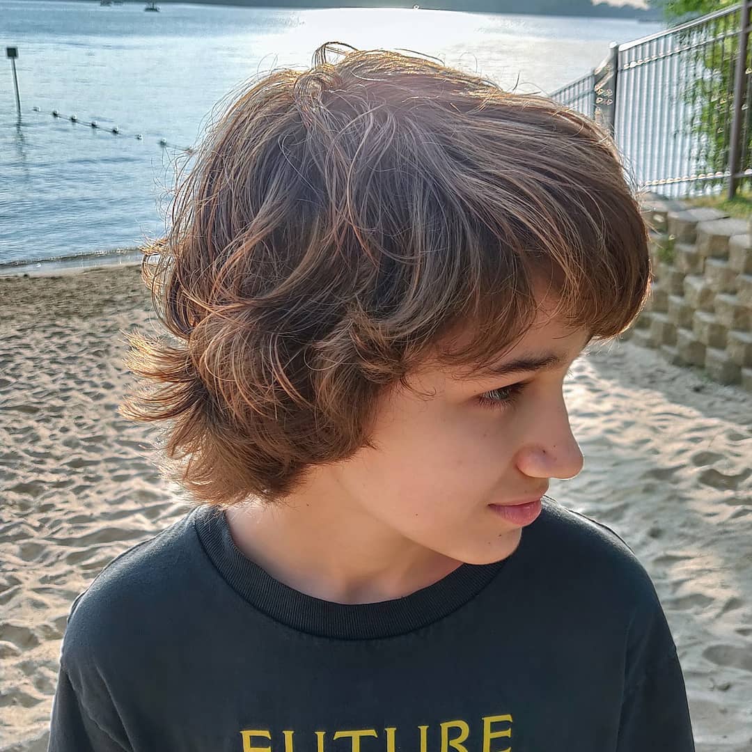 long wavy surfer shag haircut for boys