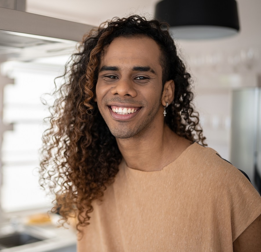 long thick curly hairstyle for men