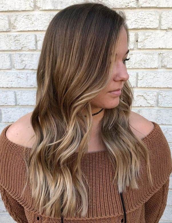 long wavy thin hair with blonde highlights