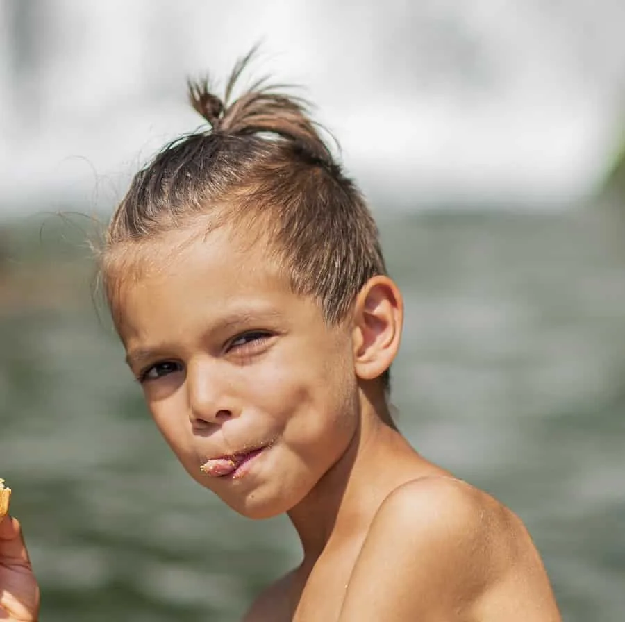 long top ponytail short sides for boys