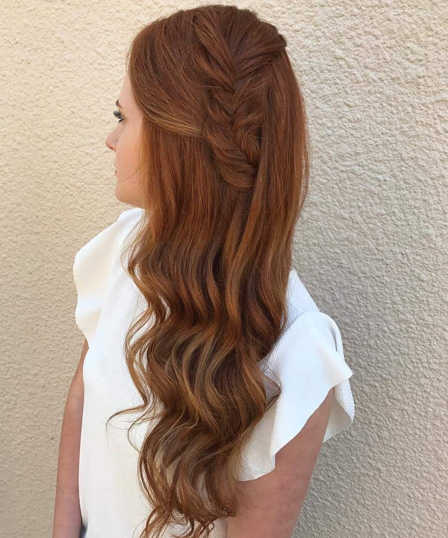 long wavy hairstyle with side braid