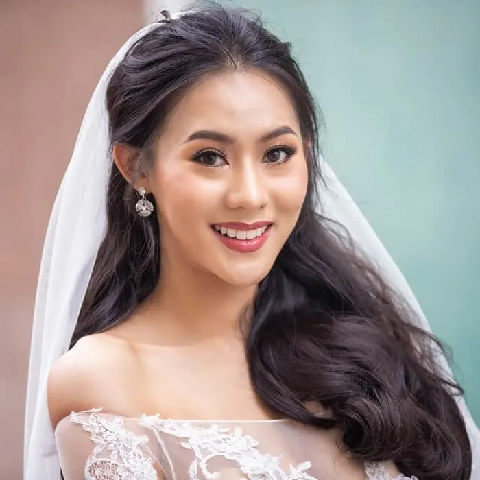 long wedding hairstyle with veil