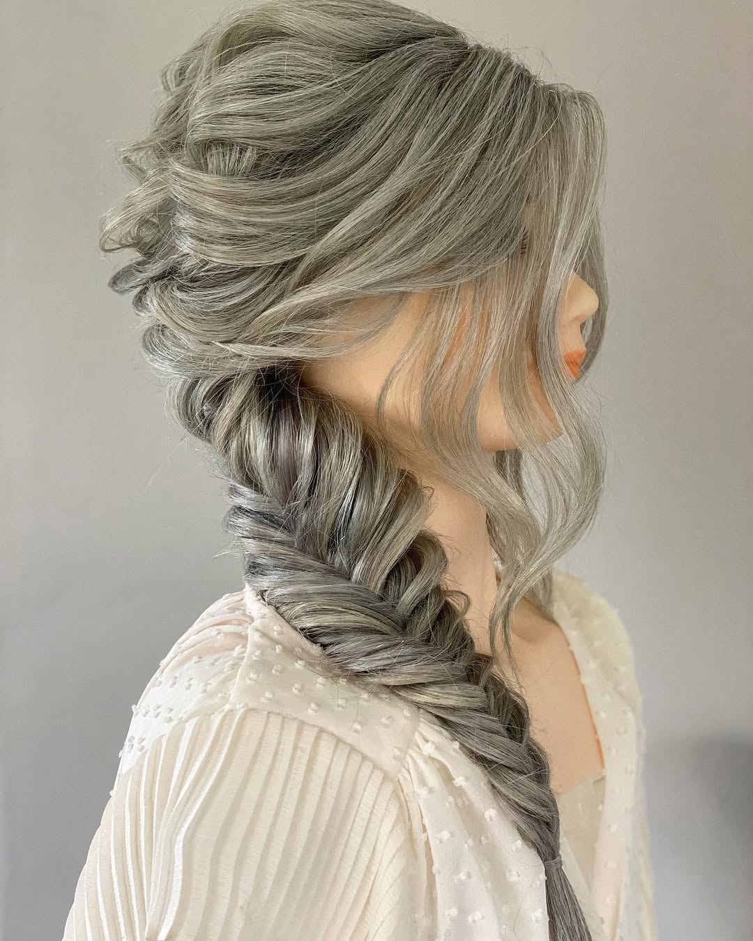loose fishtail braid for women with silver hair