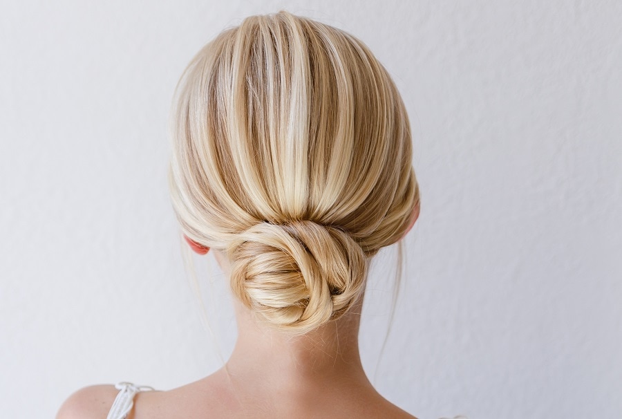 Low bun hairstyle for a bridesmaid with long hair