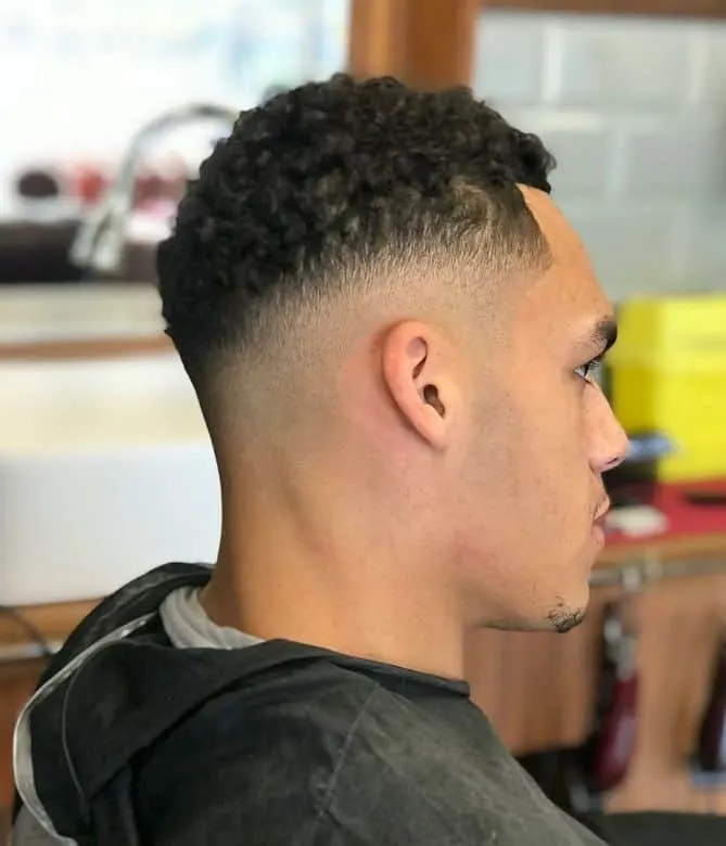 short afro hair with low skin fade