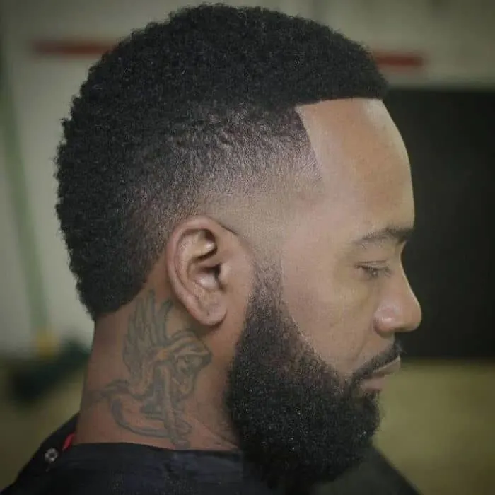low fade afro hairstyle for black men