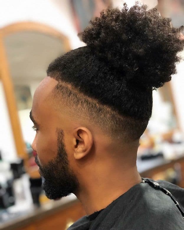 bun with afro hair and low fade