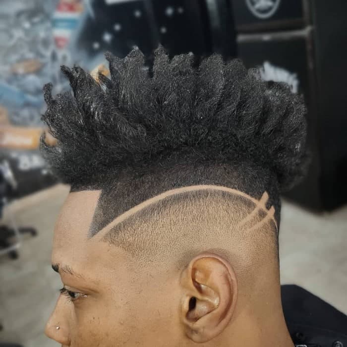 Spiky curly hair with a line design