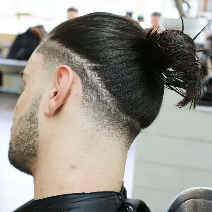 top knot with low fade for long hair